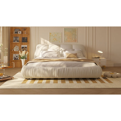 Luxury upholstered platform bed with oversized padded backrest and solid wood frame on Tampa Home & Garden Store