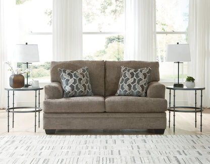 Stonemeade 3-piece living room set in taupe fabric with sofa, tables, lamps, cushions on Tampa Home & Garden Store