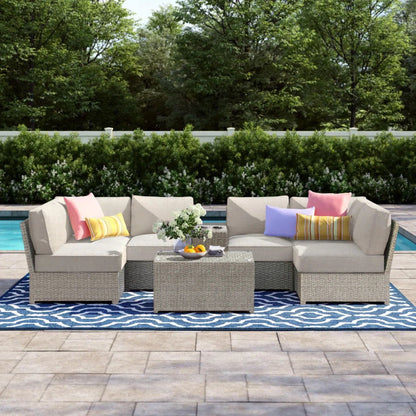 2-piece outdoor rattan sectional set with beige cushions and bright pillows HouseOfZazla on Tampa Home & Garden Store