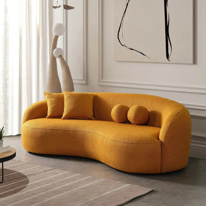 Drake Japandi Style Curvy Boucle Sofa in warm orange boucle fabric with rounded arms on Tampa Home & Garden Store