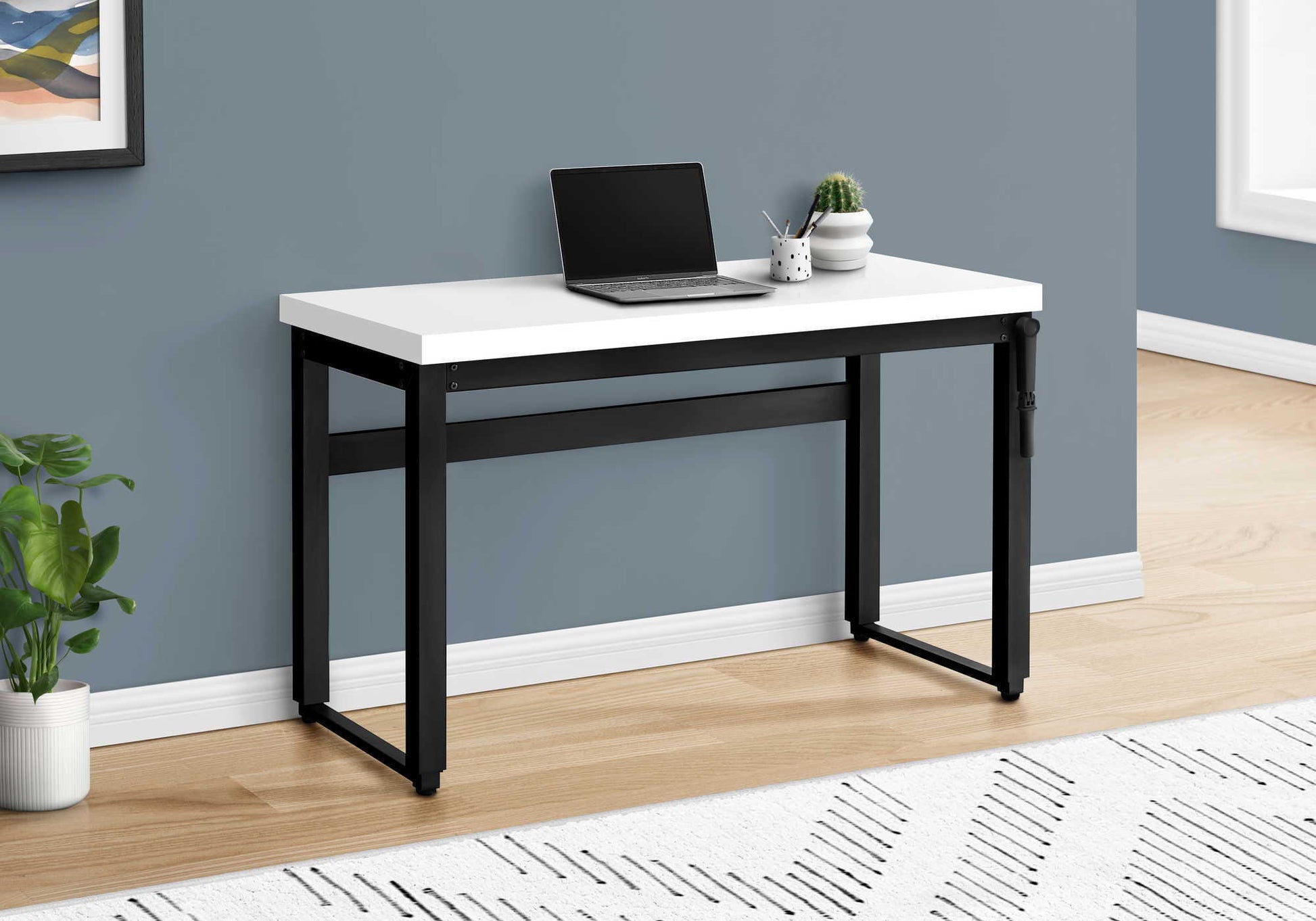 HouseOfZazla Adjustable Standing Computer Desk white top black frame; laptop and plant on Tampa Home & Garden Store