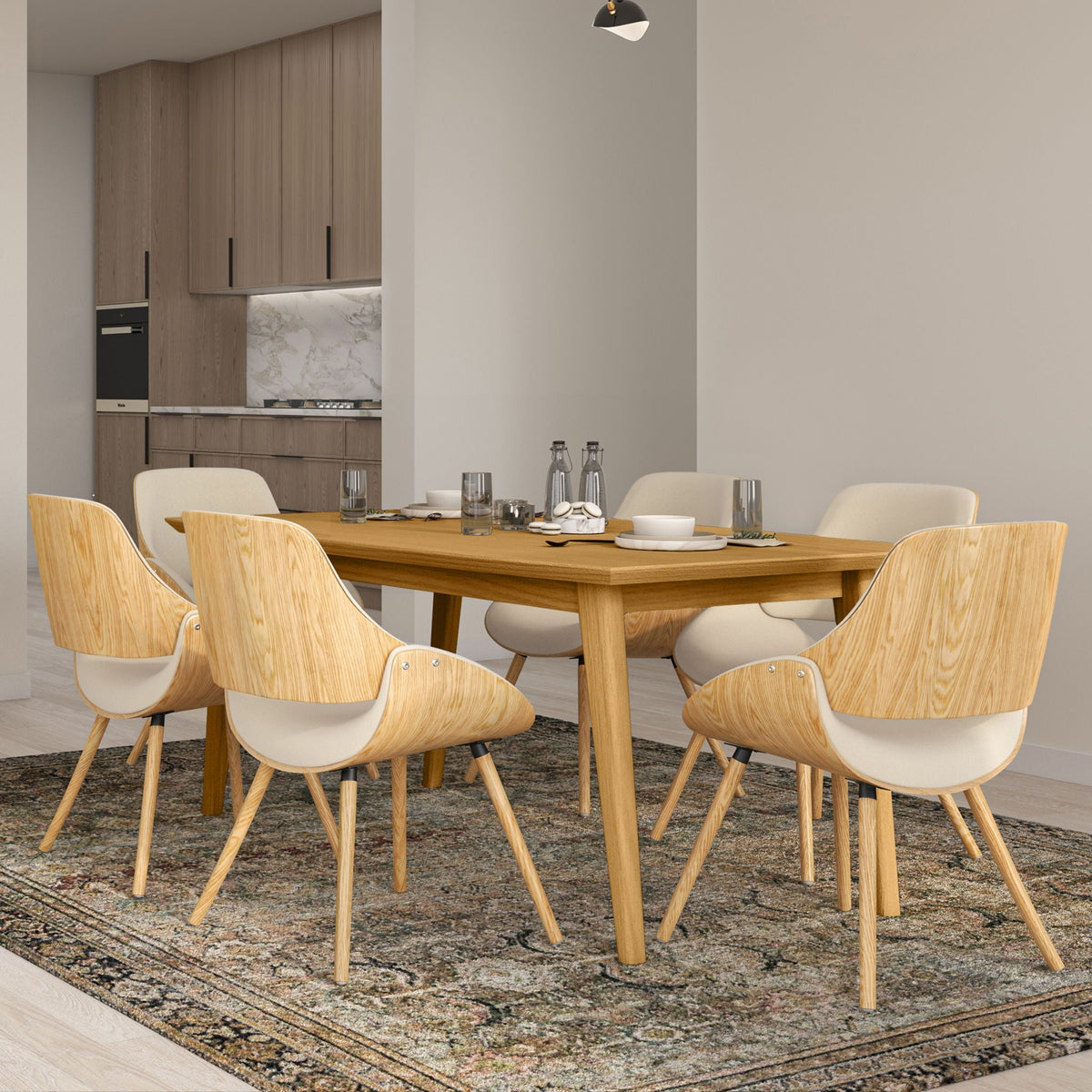 Rectangular dining table in light brown wood with six chairs in a modern dining room on Tampa Home & Garden Store