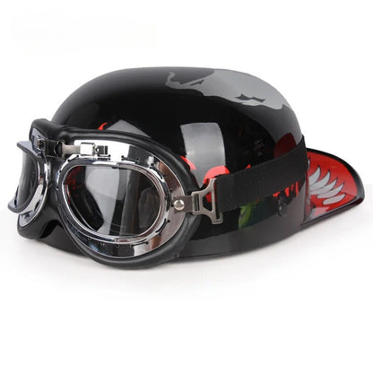 Vintage half motorcycle helmet with chrome goggles, black glossy shell and red side graphic on Tampa Home & Garden Store