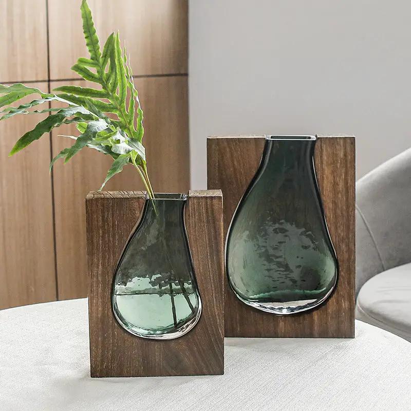 Nordic Original glass vase ornament pair on wood blocks, emerald green glass on Tampa Home & Garden Store