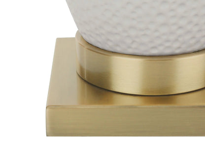 Table lamp with hammered white ceramic globe on brushed brass base and light wood plinth on Tampa Home & Garden Store