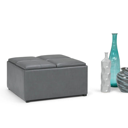 Avalon square gray storage ottoman coffee table by Unique Piece Furniture with three vases nearby on Tampa Home & Garden Store