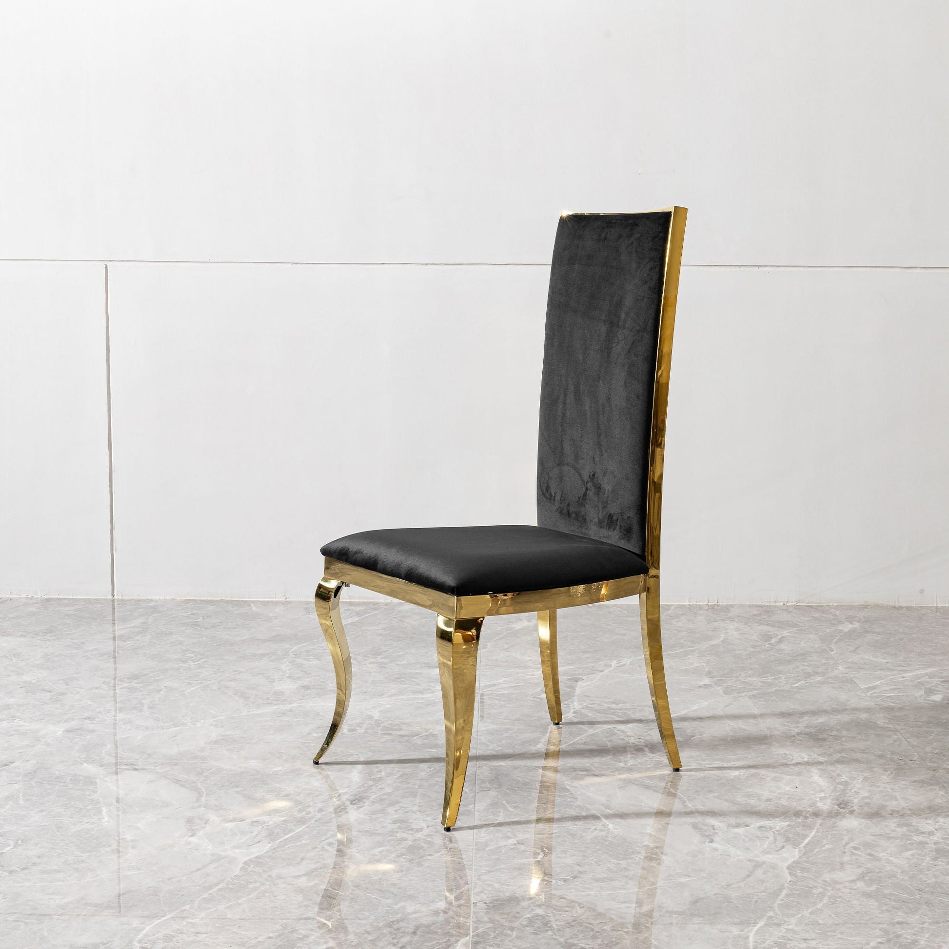 Dining chair by HouseOfZazla, black upholstered seat with gold metal legs and backrest on Tampa Home & Garden Store
