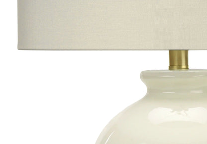 Table lamp cream fabric shade with brass stem base in transitional style on Tampa Home & Garden Store