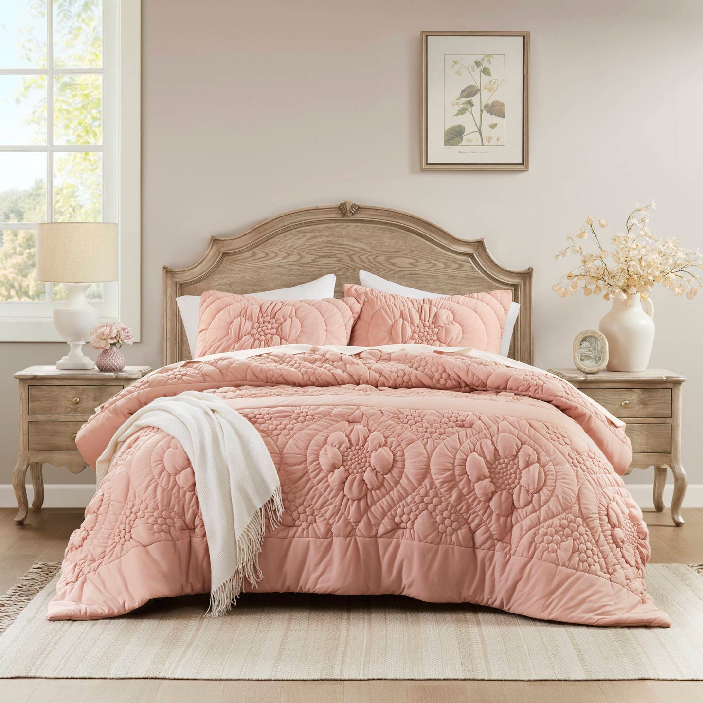 3-Piece Full/Queen Pink Quilted Comforter Set with matching shams on a wooden bed on Tampa Home & Garden Store