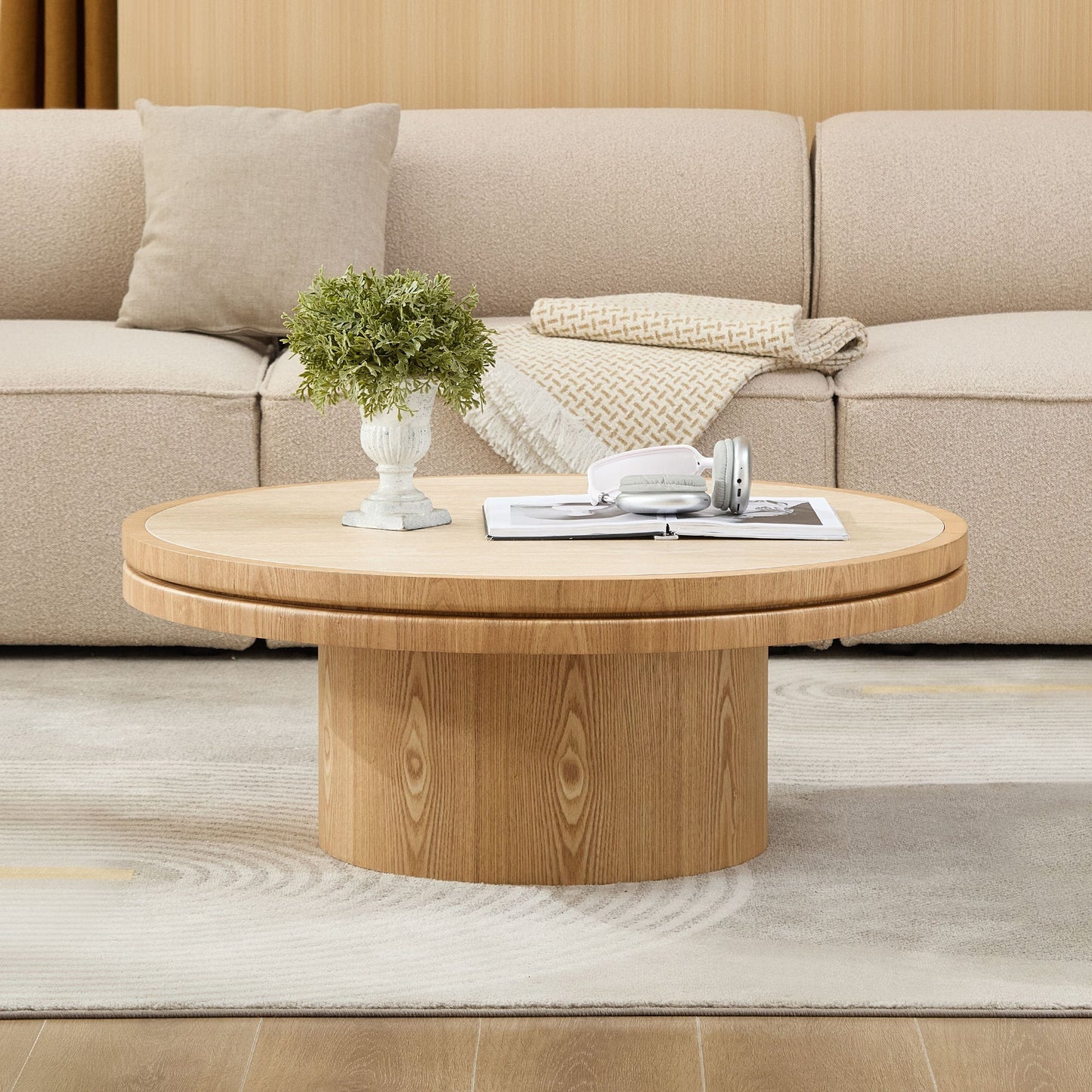 35.43 Inch Round Coffee Table with Sintered Stone Top, light wood finish; plant and magazine on top on Tampa Home & Garden Store