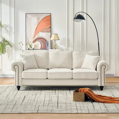 3 seater sofa beige with tufted upholstery, rolled arms, nailhead trim on Tampa Home & Garden Store