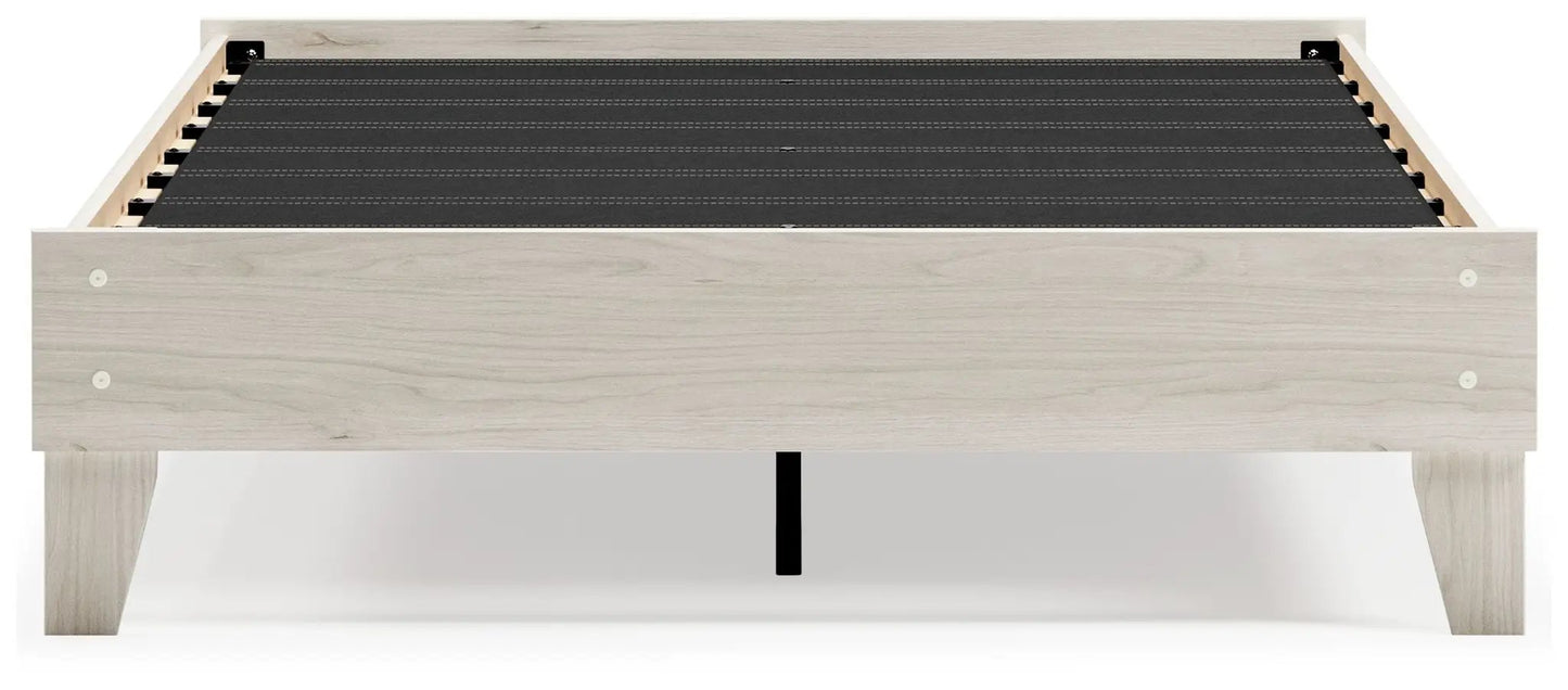 Socalle platform bed by Unique Piece Furniture in light wood frame with black platform deck on Tampa Home & Garden Store
