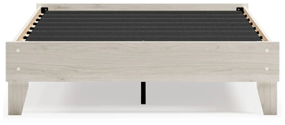 Socalle platform bed by Unique Piece Furniture in light wood frame with black platform deck on Tampa Home & Garden Store