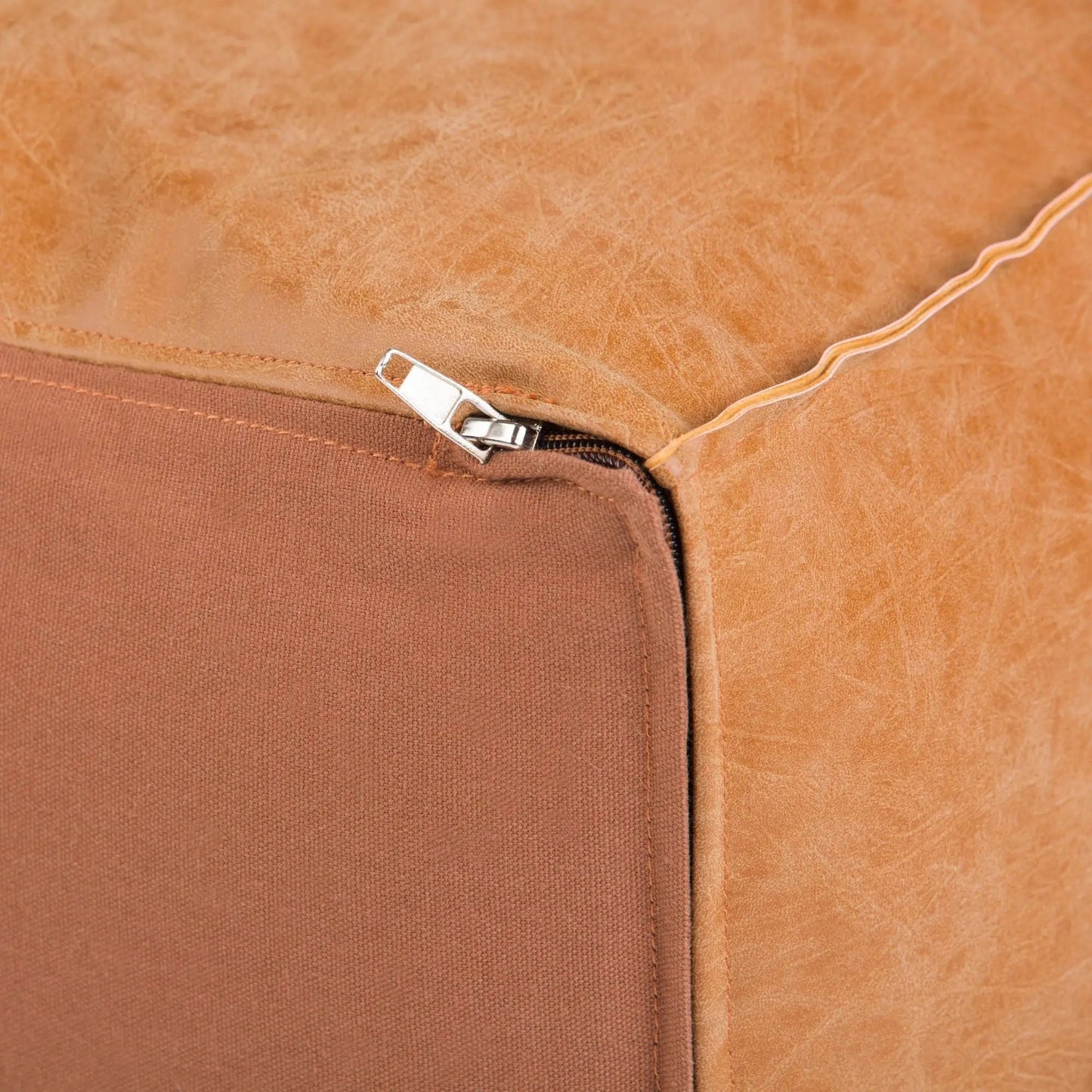Brody large square coffee table pouf in tan leather with visible zipper and stitched edge on Tampa Home & Garden Store