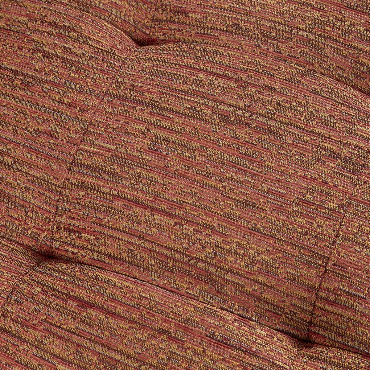 Tufted upholstery lounge chair fabric close-up in red-orange tones, HouseOfZazla armchair on Tampa Home & Garden Store