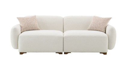 Darius Boucle Sofa beige with 2 peach toss pillows, by Unique Piece Furniture on Tampa Home & Garden Store