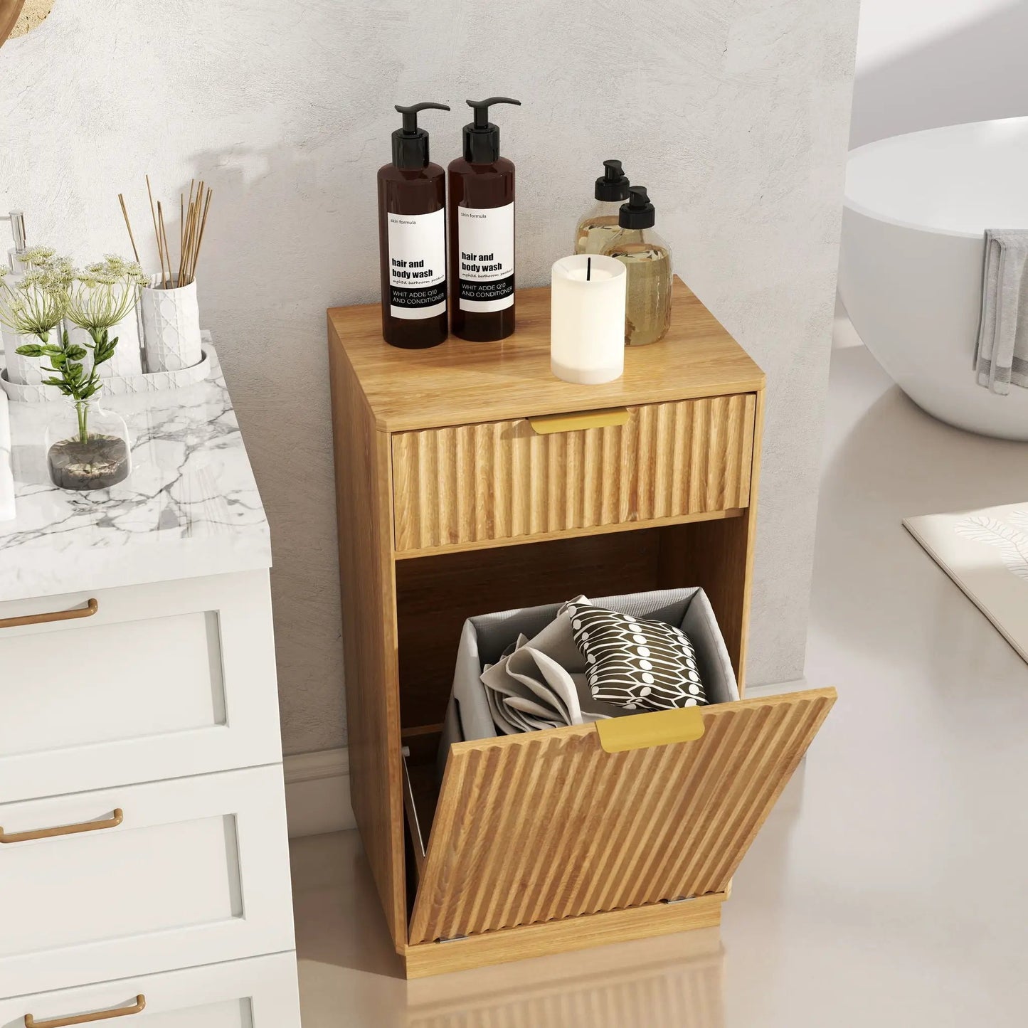Tilt Out Trash Can Cabinet in warm wood with wave textured drawer fronts on Tampa Home & Garden Store