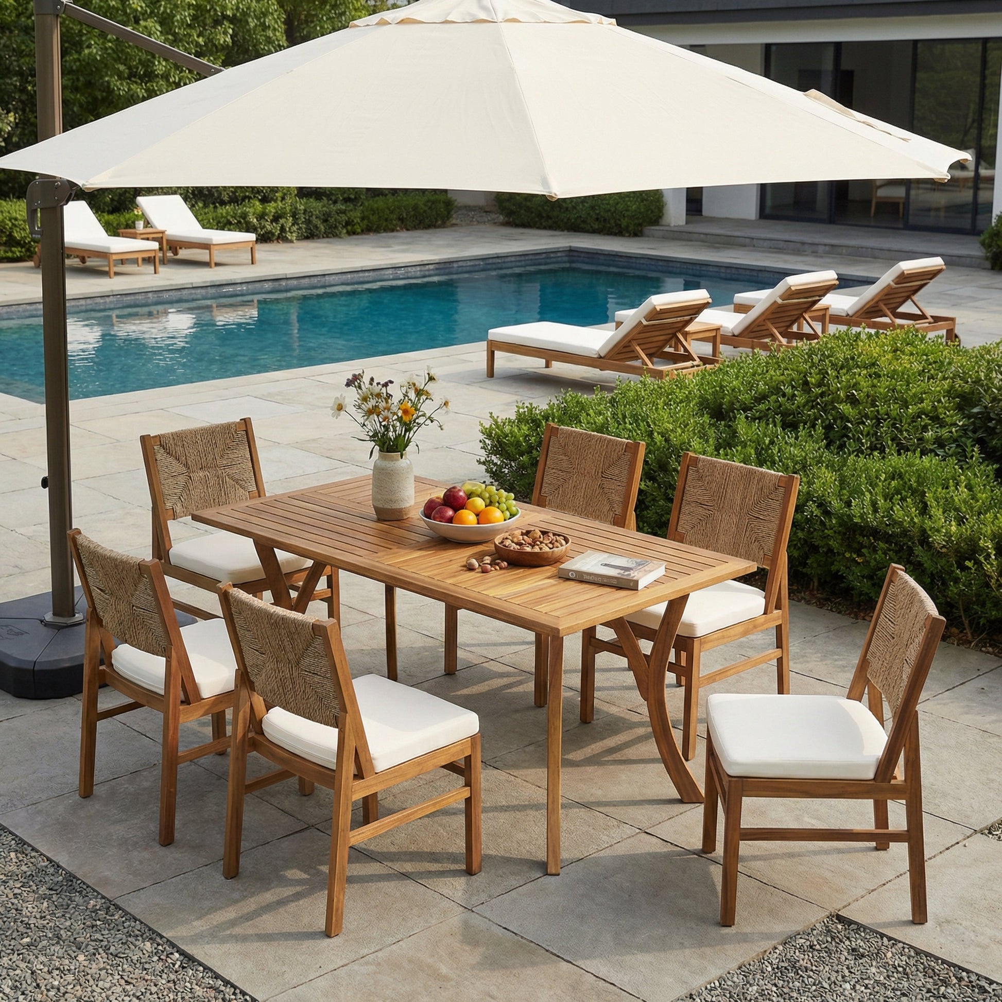 Outdoor 7 Piece Patio Rustic Acacia Wood Dining Set with white cushions and umbrella by the pool on Tampa Home & Garden Store