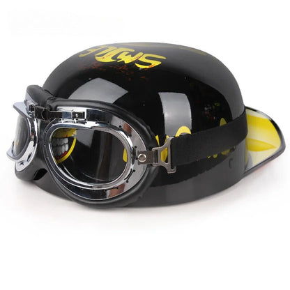 Vintage half motorcycle helmet in black gloss with chrome-rimmed goggles on Tampa Home & Garden Store