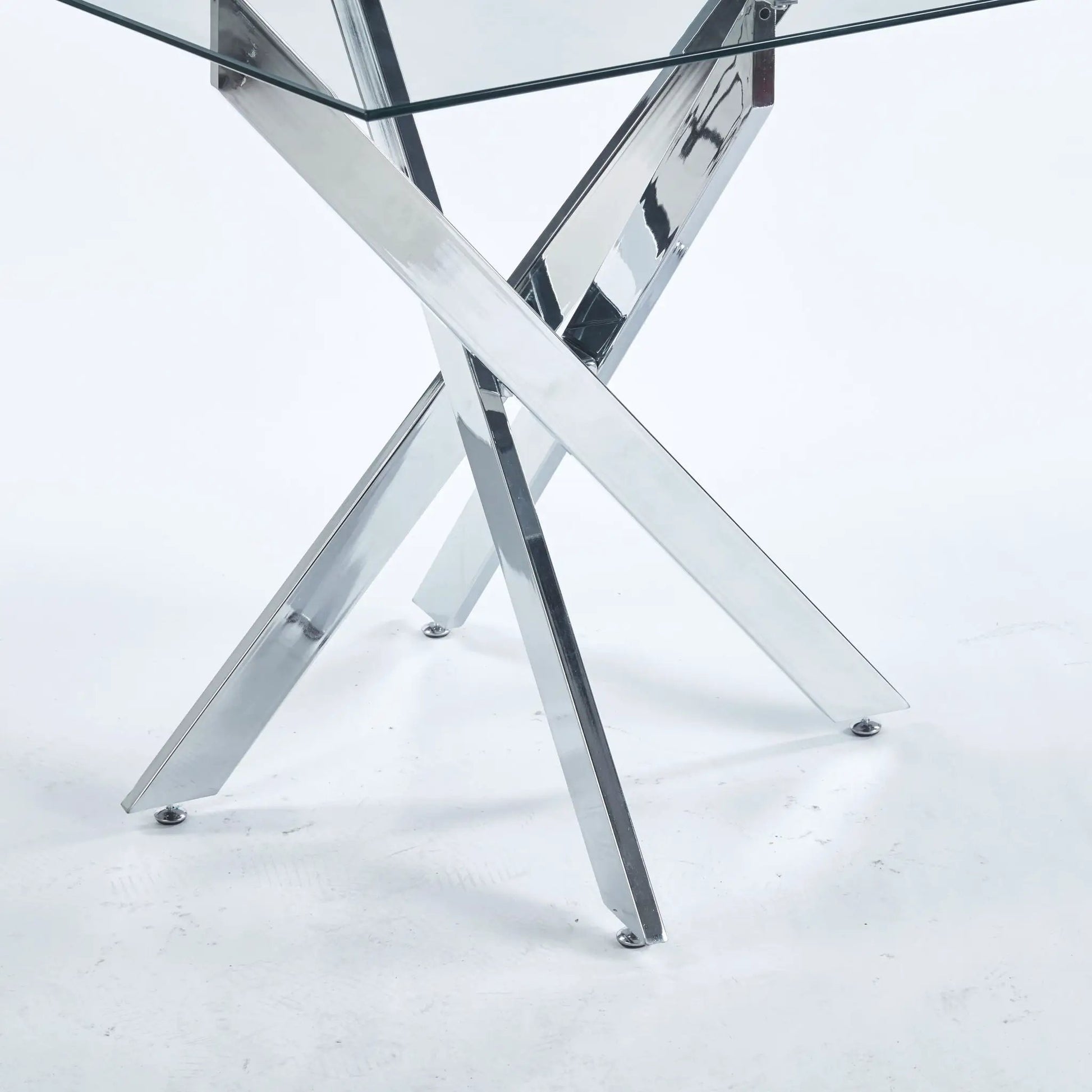Dining table with cross metal legs and tempered glass square top on Tampa Home & Garden Store