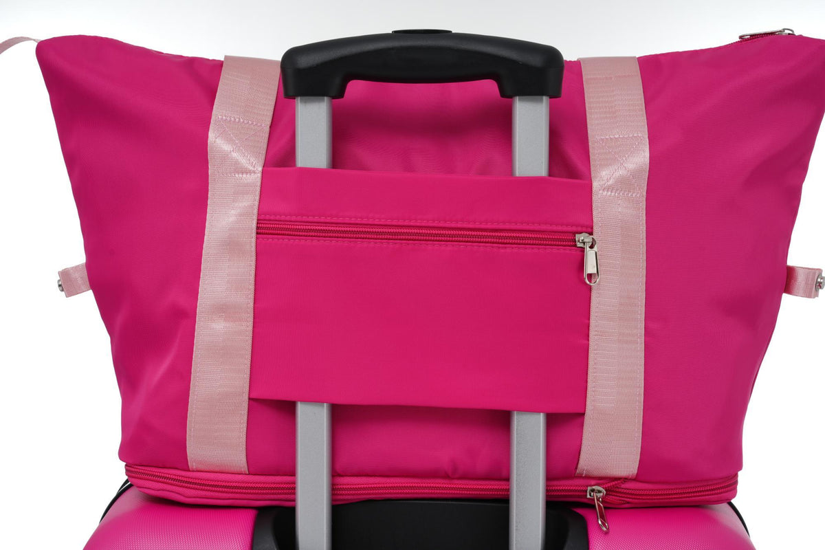 HouseOfZazla pink luggage bag with retractable handle and beige webbing straps front zipper pocket on Tampa Home & Garden Store