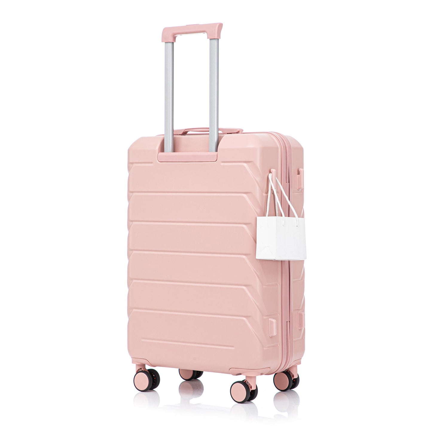 Pink hard-shell spinner luggage with telescoping silver handle and four wheels white tag on Tampa Home & Garden Store