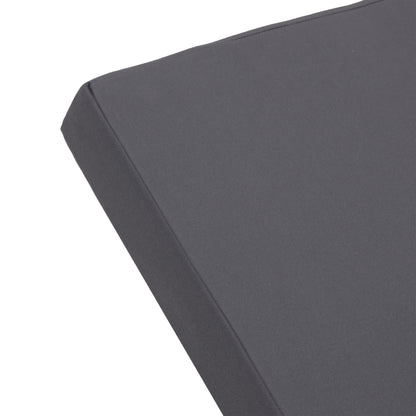 Outdoor chaise lounge cushion close-up in charcoal gray fabric with visible seams on Tampa Home & Garden Store