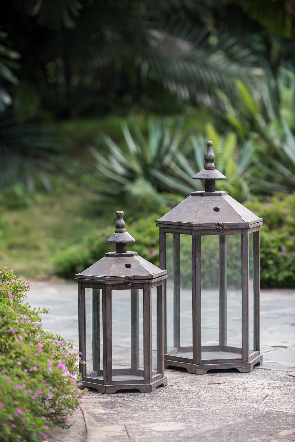 Pair of S/2 Graca Polygon Temple Garden Lanterns in weathered metal with glass panels on Tampa Home & Garden Store