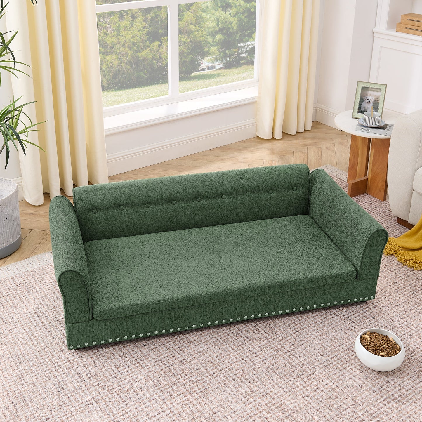 Oversized pet sofa in green fabric with tufting in modern room on Tampa Home & Garden Store