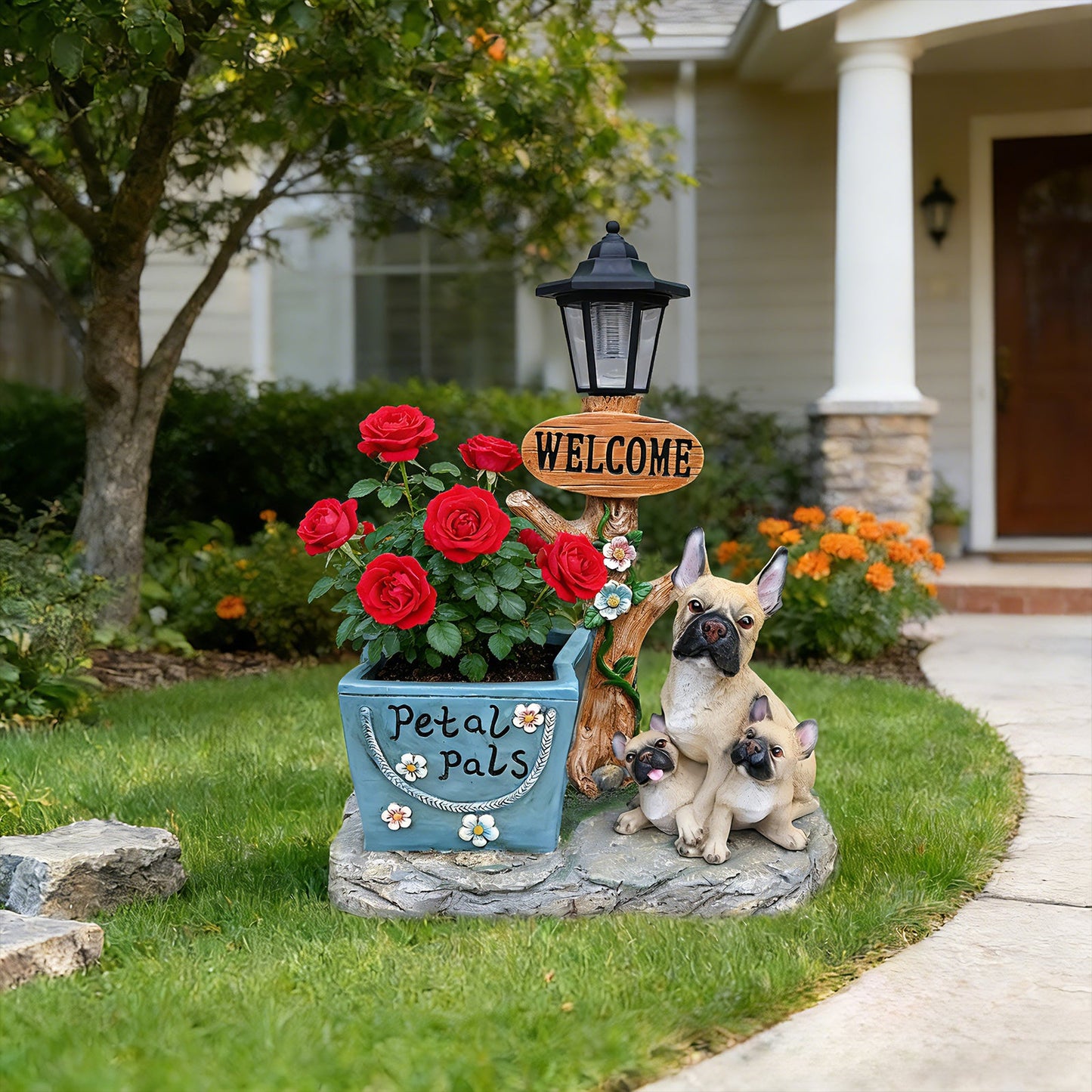 French Bulldog family statue by HouseOfZazla with blue planter and red roses plus a lantern on Tampa Home & Garden Store