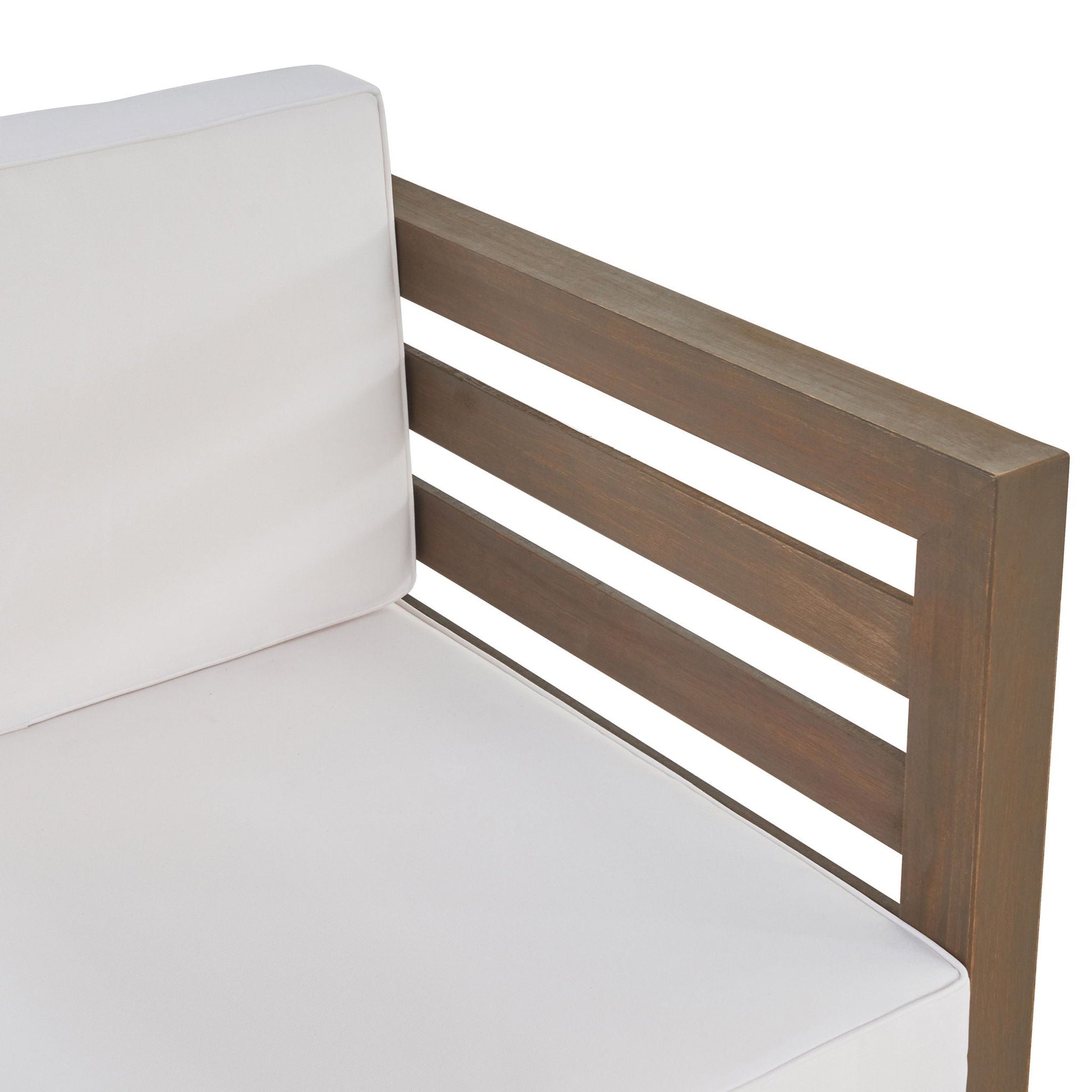 Outdoor Acacia Wood Patio Chair with white fabric cushion and wooden armrests on Tampa Home & Garden Store