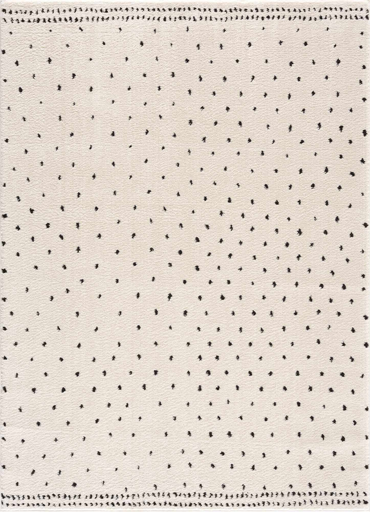 Julie Area Rug by Boutique Rugs in ivory with tiny black dot motif on Tampa Home & Garden Store