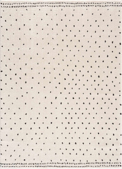 Julie Area Rug by Boutique Rugs in ivory with tiny black dot motif on Tampa Home & Garden Store