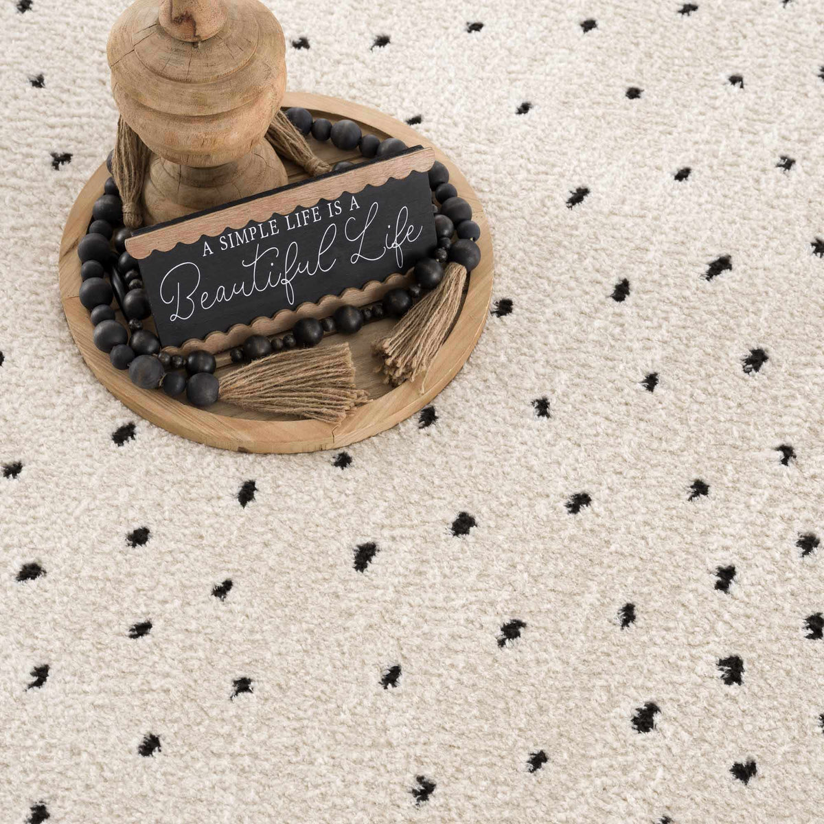 Julie Area Rug beige shag with tiny black dot motif by Boutique Rugs on Tampa Home & Garden Store