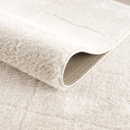 Koume Ivory Area Rug plush ivory pile with a rolled edge on Tampa Home & Garden Store