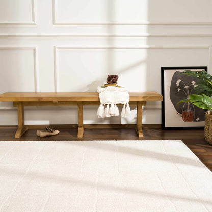 Koume Ivory Area Rug Boutique Rugs ivory textured rug on wood floor with panel wall on Tampa Home & Garden Store