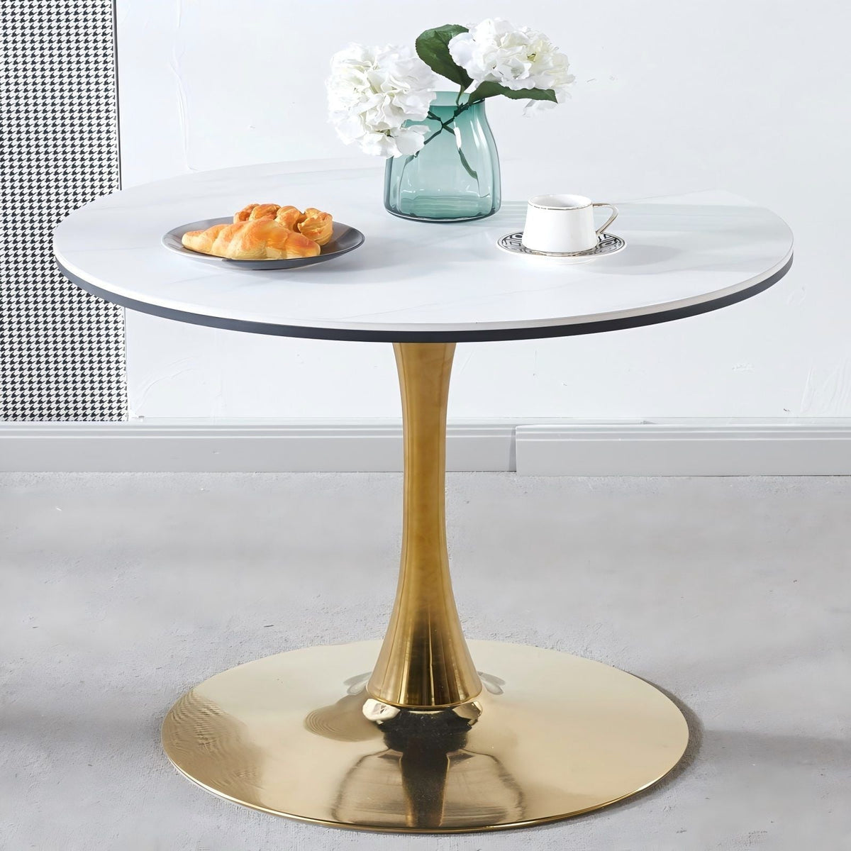 Gold Tulip Mid-Century Dining Table with round white top and gold pedestal base on Tampa Home & Garden Store