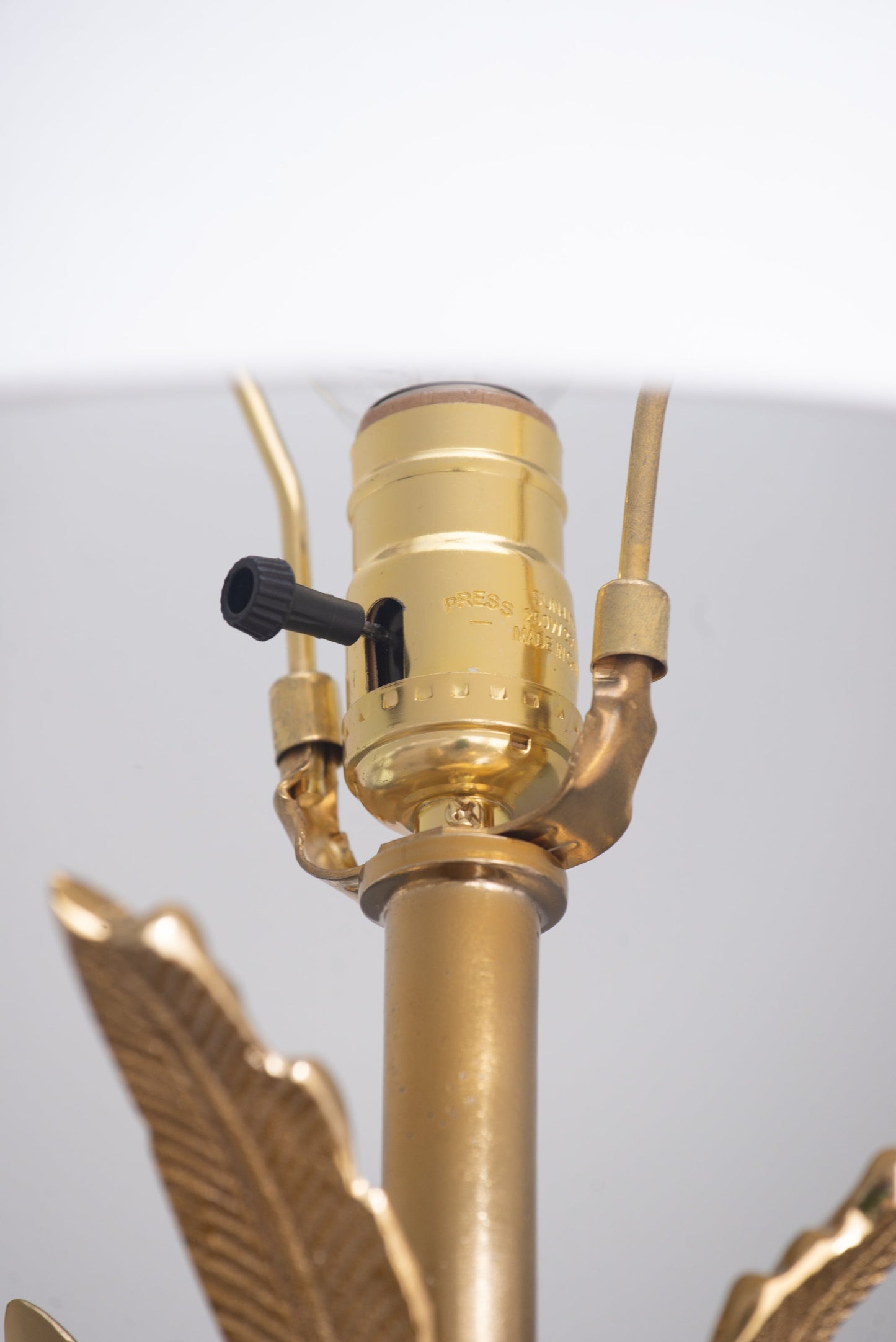 Leaf lamp in gold finish with carved leaves and marble base, table lamp on Tampa Home & Garden Store