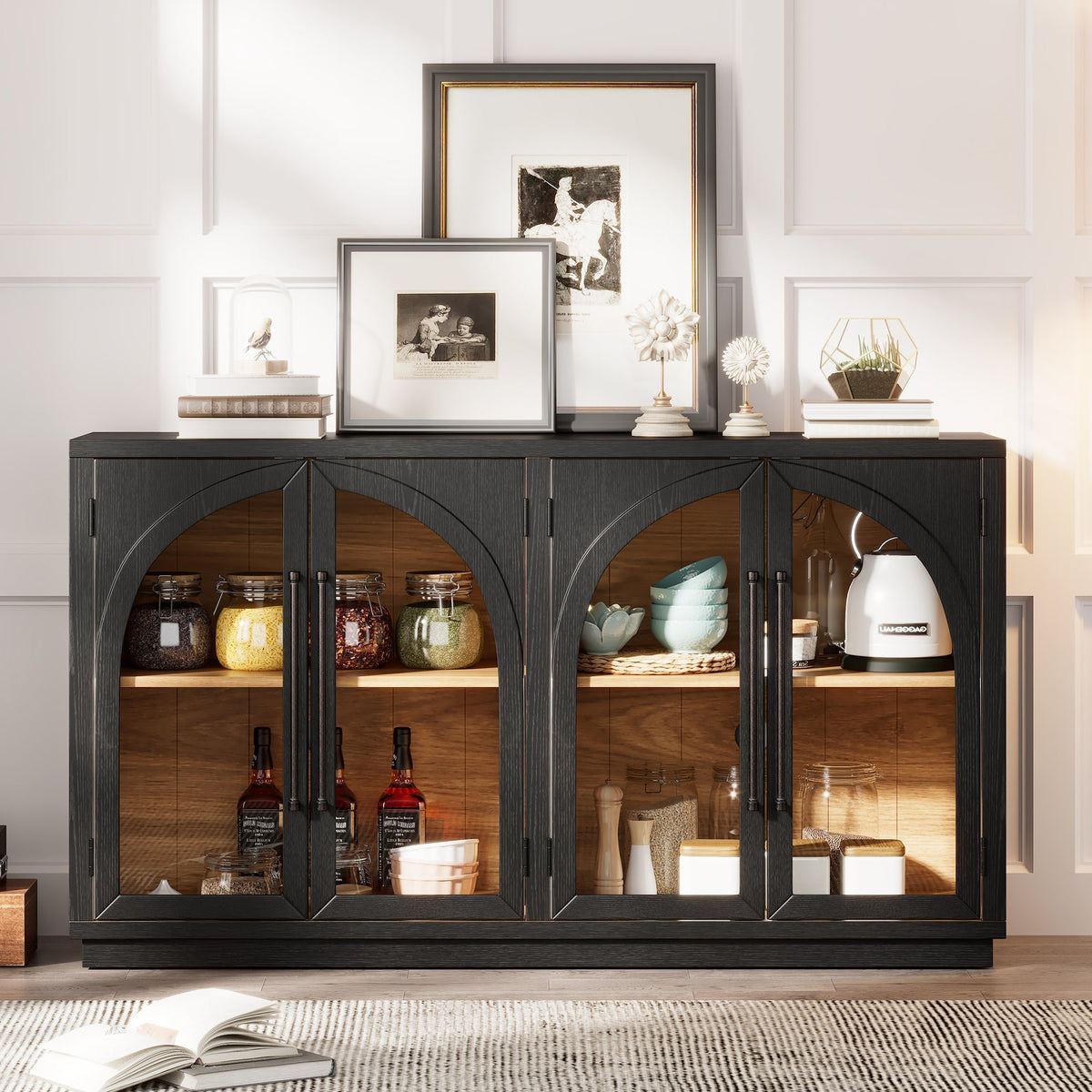 Black 4-door arched glass-front sideboard displaying jars and bowls, with framed art on top on Tampa Home & Garden Store