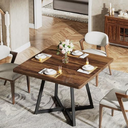 Square dining table in brown wood with black legs, four place settings in a dining room on Tampa Home & Garden Store