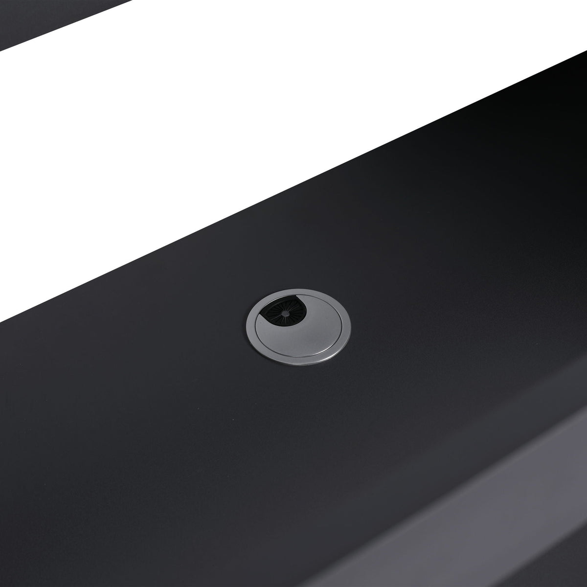Freestanding bath vanity chrome drain close-up on black countertop with white diagonal stripe on Tampa Home & Garden Store