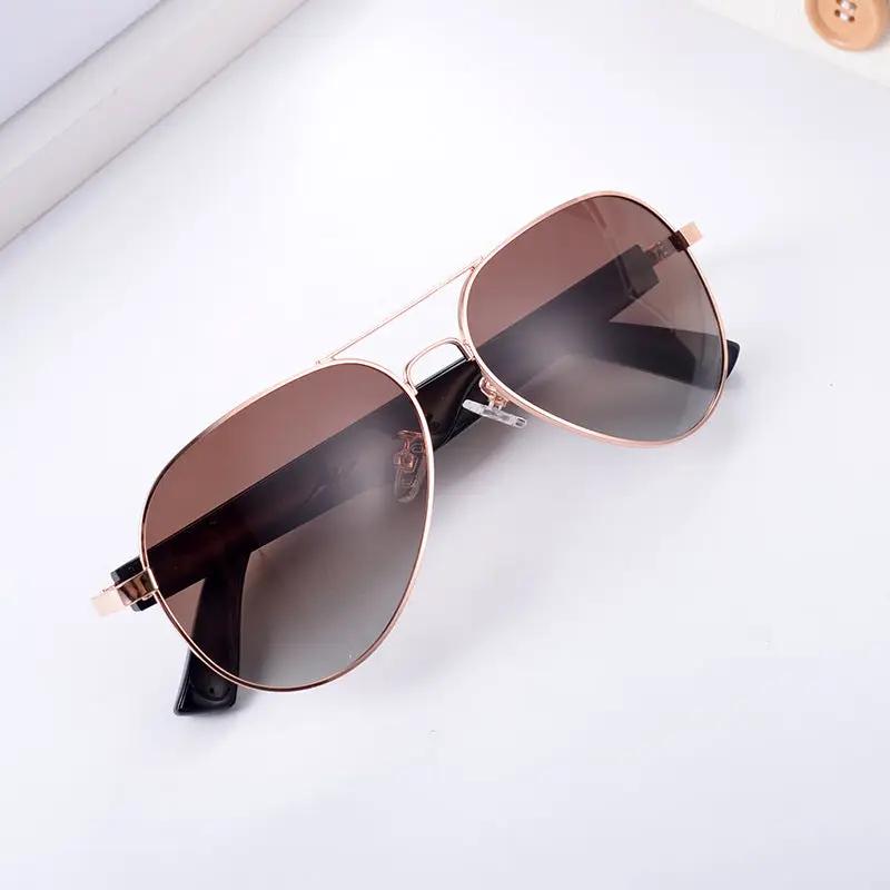 Aviator sunglasses with rose-gold metal frame and brown gradient polarized UV lenses on Tampa Home & Garden Store