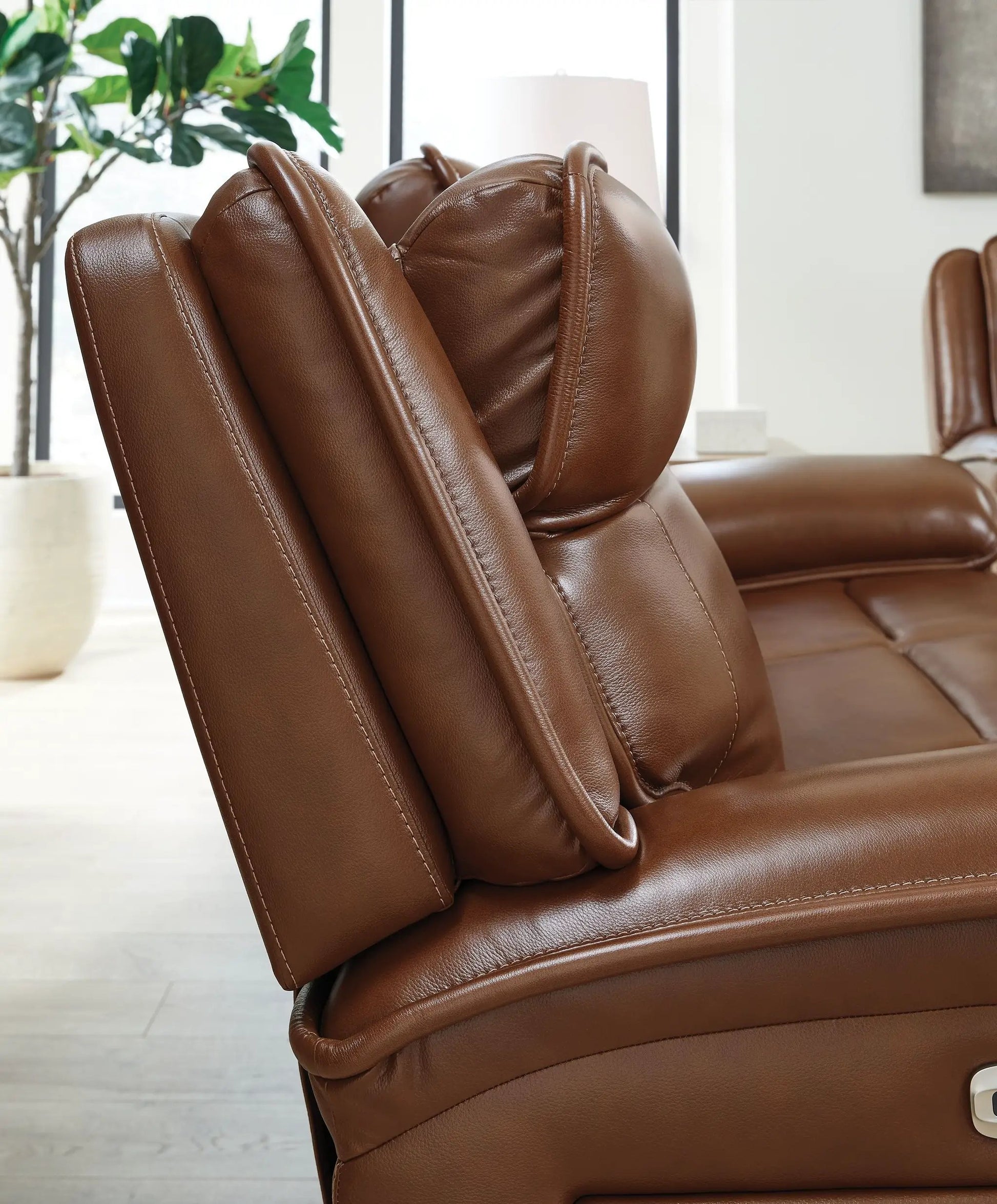 Healy Pier Power Reclining Sofa with Adj Headrest in chocolate brown leather on Tampa Home & Garden Store