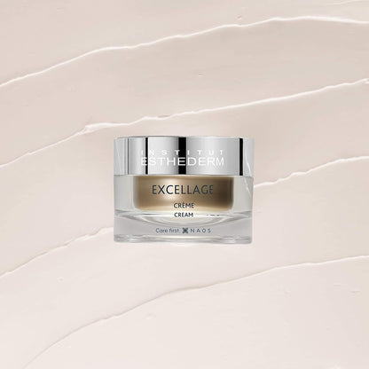 Institut Esthederm Excellage face cream jar with silver lid on beige backdrop on Tampa Home & Garden Store