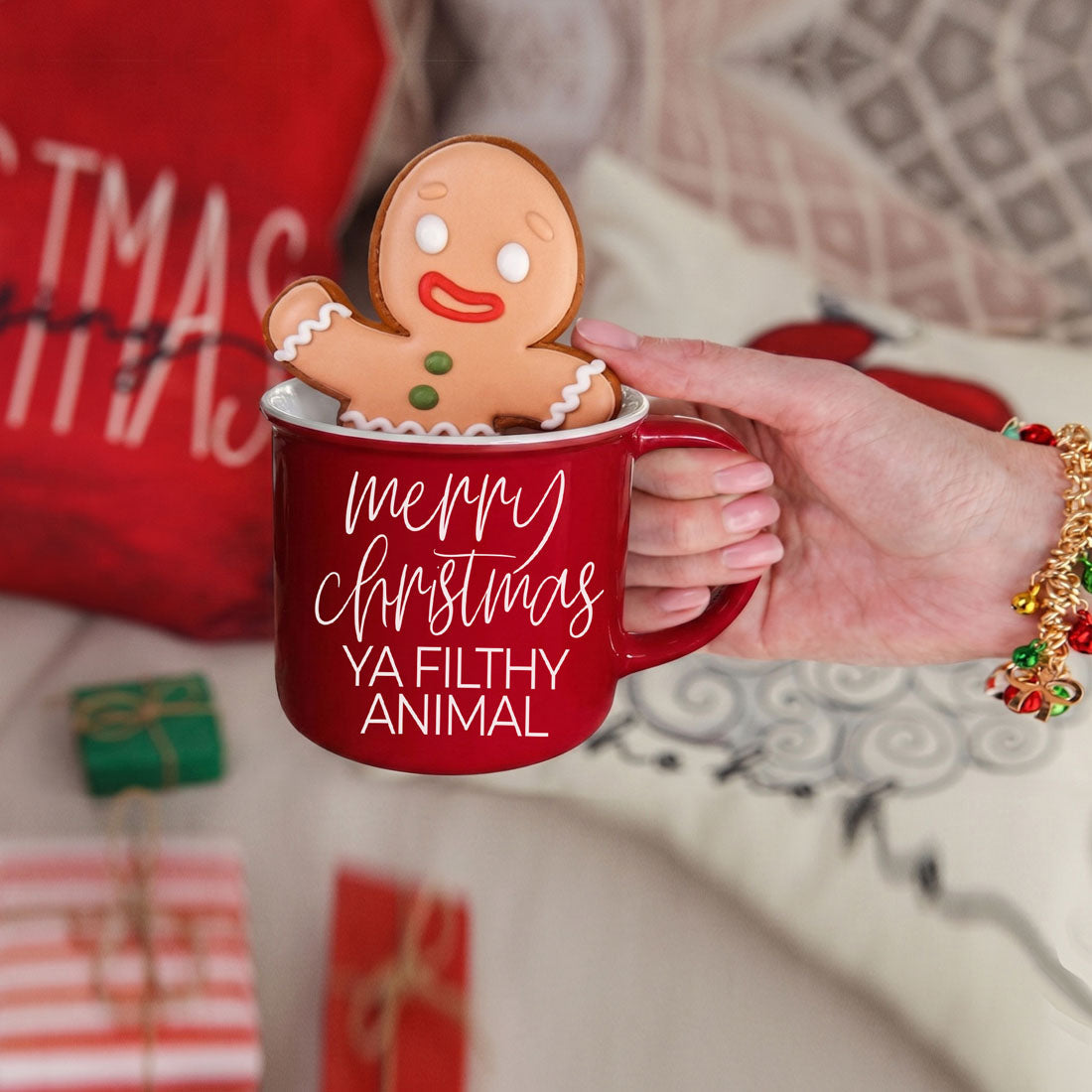 Ya Filthy Animal coffee mug in red with white script and gingerbread man perched on rim on Tampa Home & Garden Store