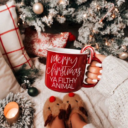 Coffee mug Gia Roma Ya Filthy Animal red mug with candy cane handle in a cozy Christmas scene on Tampa Home & Garden Store