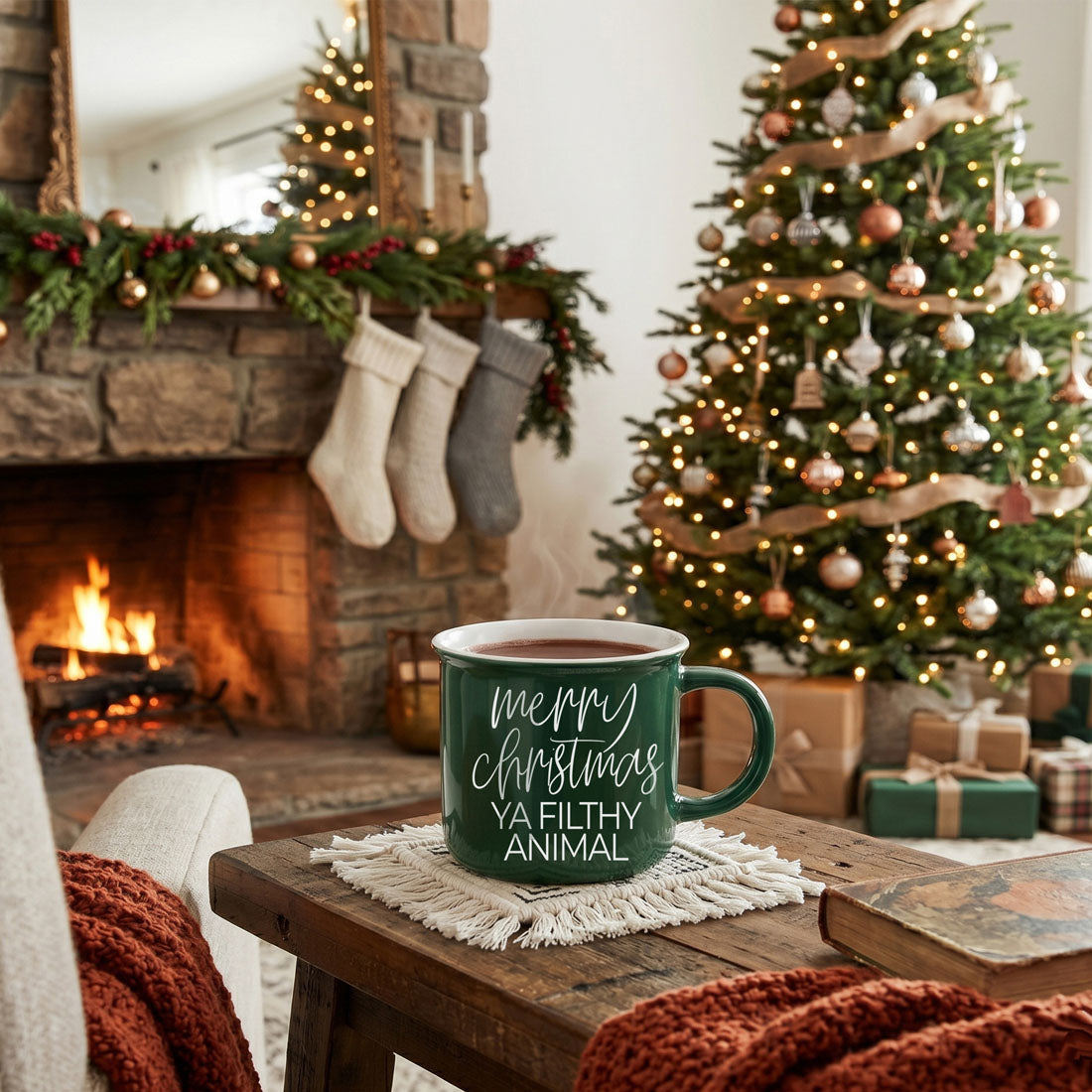 Green ceramic mug with white script merry christmas ya filthy animal on rustic table on Tampa Home & Garden Store