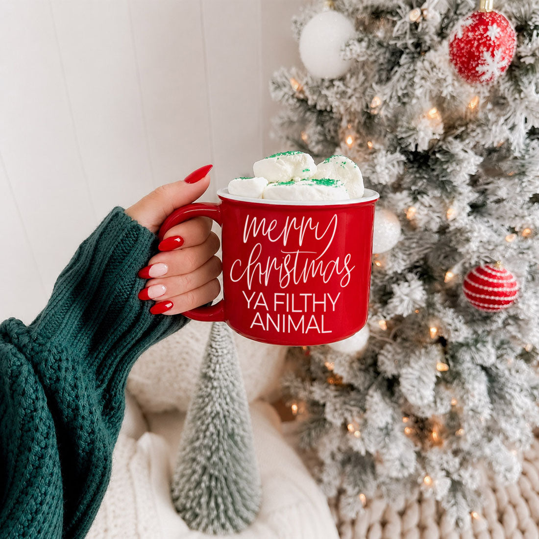 Ya Filthy Animal mug Gia Roma red ceramic, marshmallows, green knit sleeve, Christmas tree backdrop on Tampa Home & Garden Store