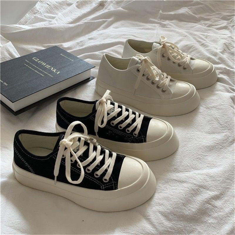 Stevvex white canvas platform sneakers; two white low-tops and two black-white low-tops on Tampa Home & Garden Store