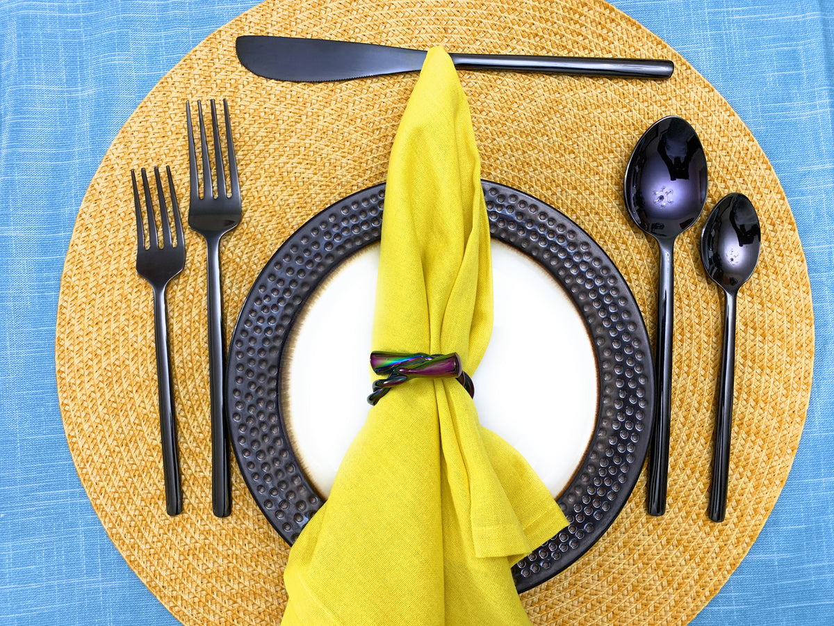 Vibhsa Black Flatware Set 20-Piece stainless steel dining utensils on a black textured plate on Tampa Home & Garden Store